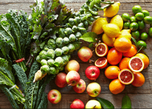 a group of fruits and vegetables on a wood surface Healthy Weight Loss Diets Chapeltown